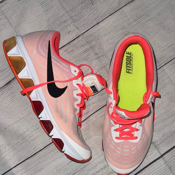 Nike Women's orange and black Athletic Shoes - Picture 1 of 7